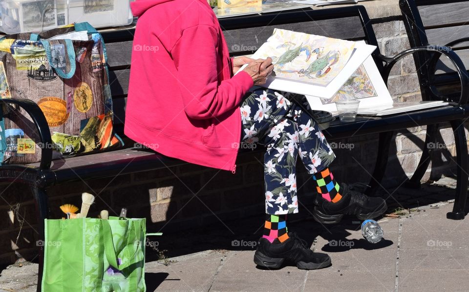 Elderly drawing outdoors