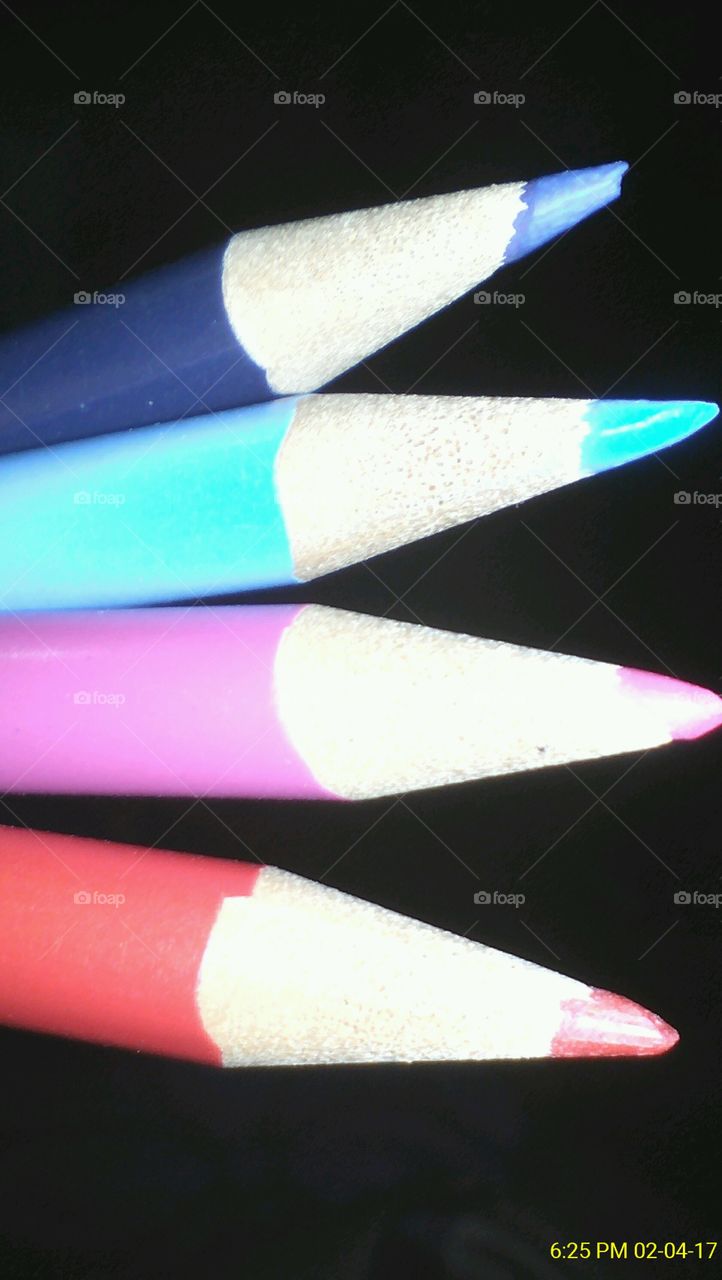 Colourful pencil colours with a flash in the dark