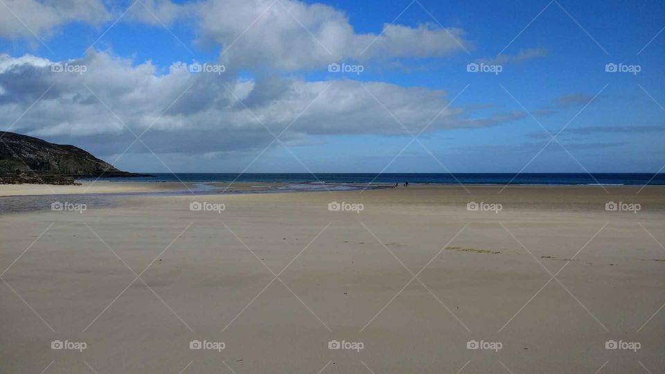 Blue sky, sandy beach