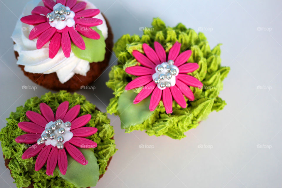 Crazy cupcakes, muffins, a cupcake, a bright cupcake, a cupcake with cream, Cake, sweetness, dessert, cream, bright cake, sugar, delicious cake, flower, cake with flower, color, Fruitcake