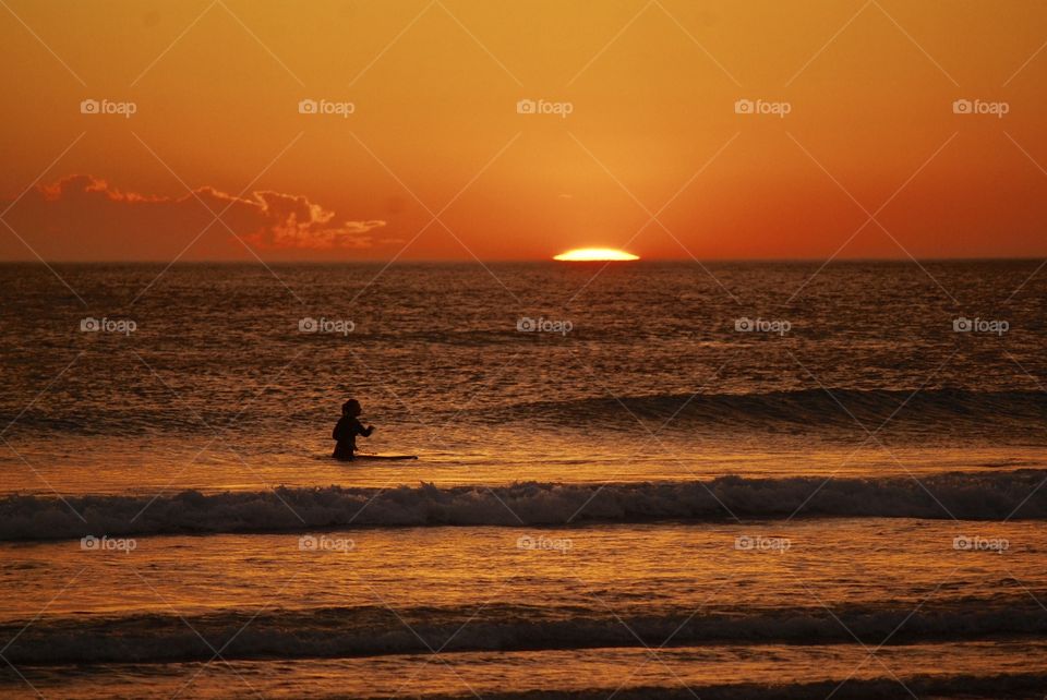 Waiting for a wave at Surf Beach Phillip Island