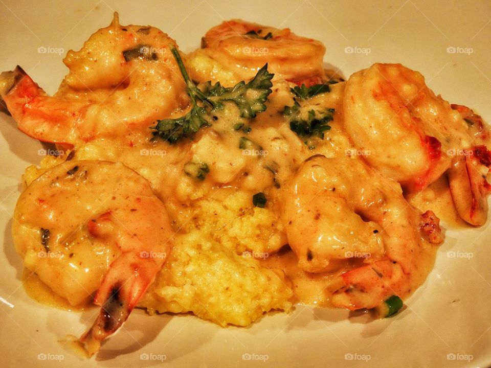 Prawns In Garlic Sauce With Creamy Polenta. Chinese Seafood Dish