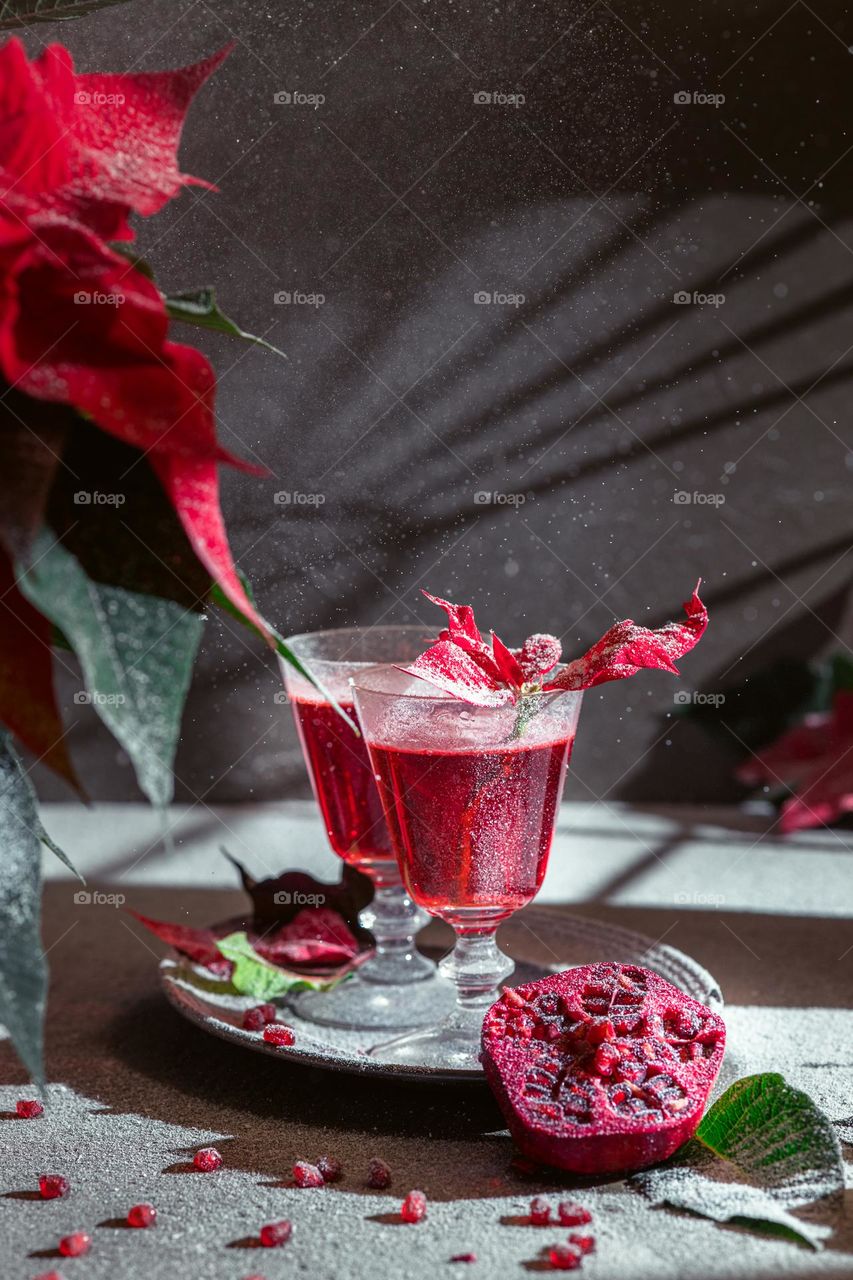 winter festive pomegranate drink in a dark surrounding