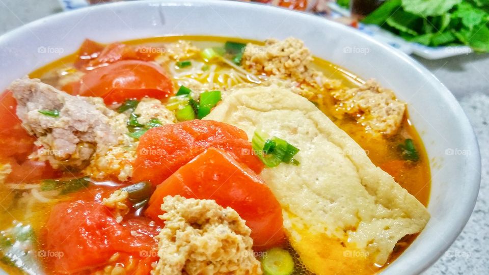 Vietnamese pork and crab noodle soup. Known as Bun Rieu Cua, this is a very popular dish.