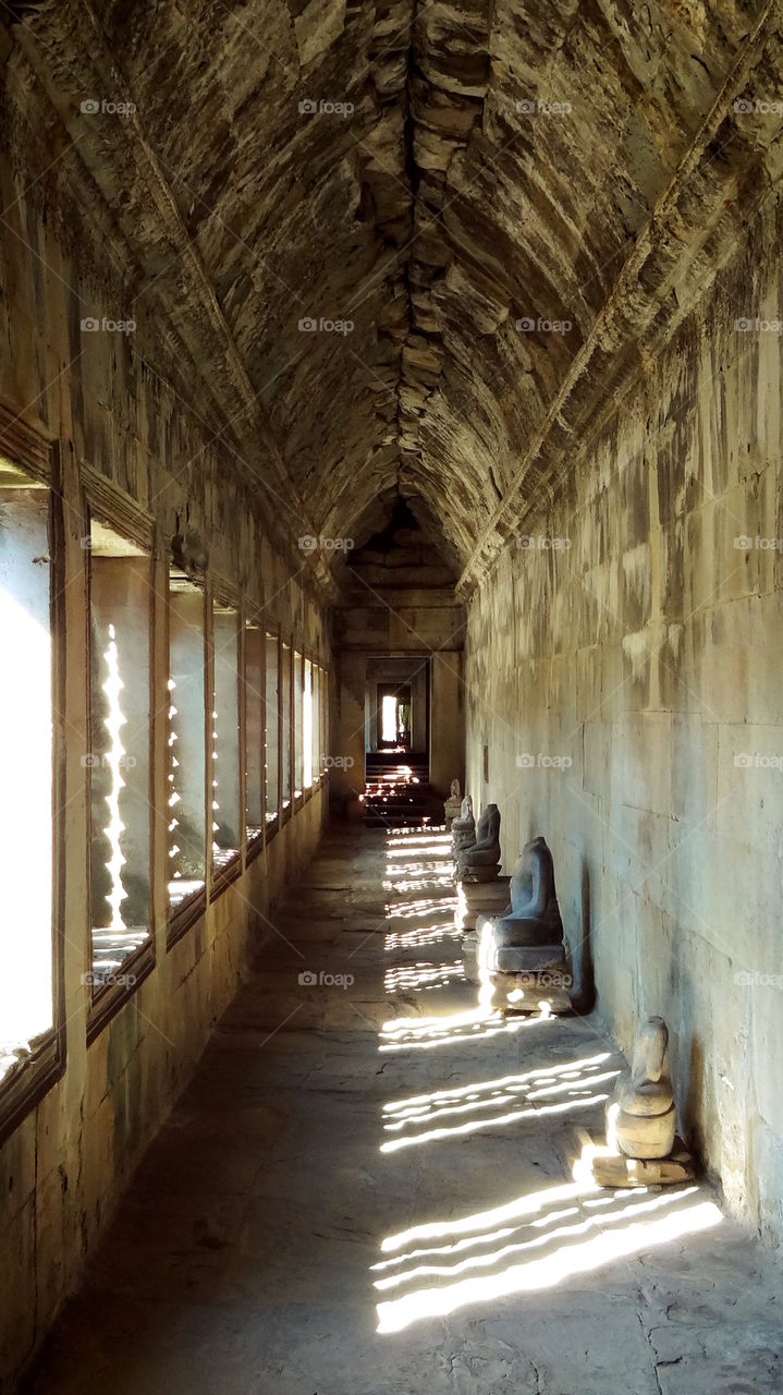 Cambodian temple hall of buddhas angkor wat cambodia siem reap closer cropped. Hall of warm light