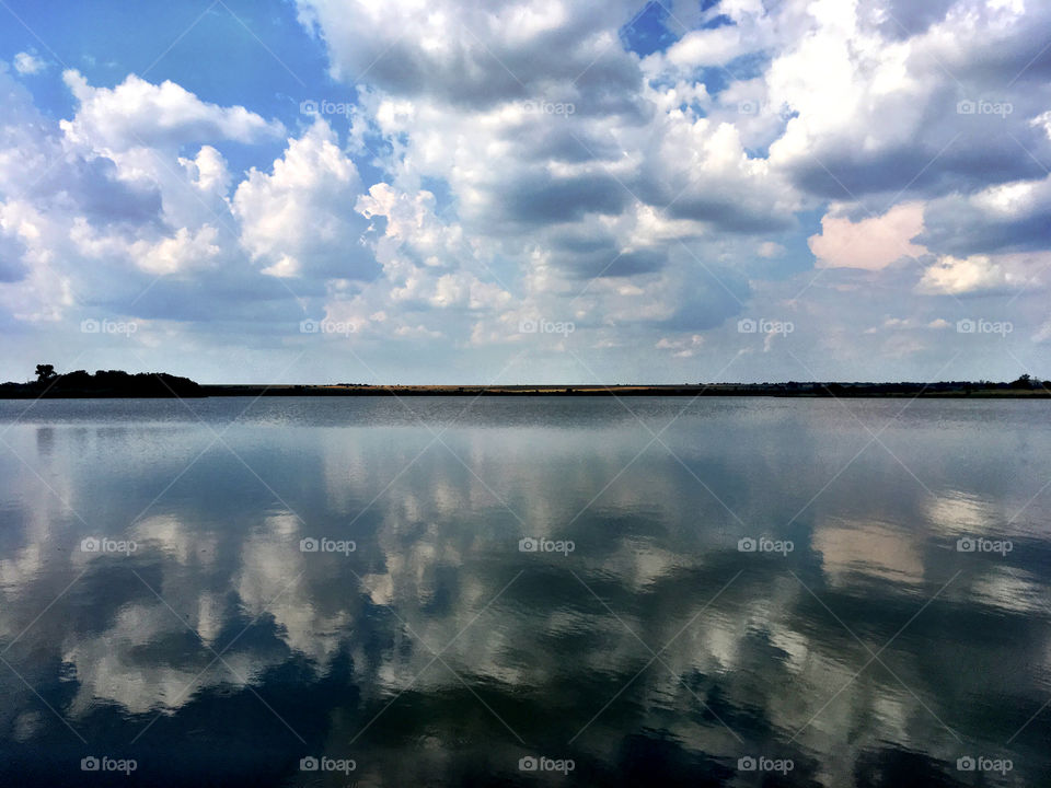 Cloud mirror image on lake