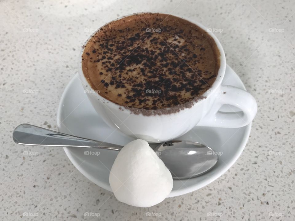 A cup of coffee with marshmallow