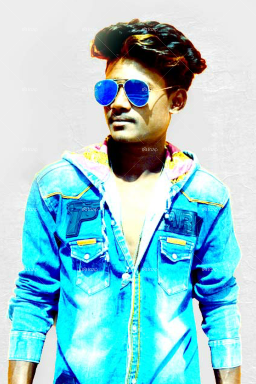 Photo of boy on light gray color background/model photo on blue shirt/beautiful model photo on glasses/a perfect model photo/perfect model photo/indian model photo on glasses/awesome model photo/model half close up photo/new style Model Model/new