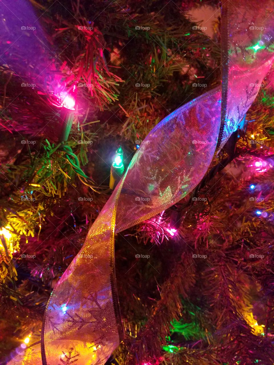 We love the relaxation of enjoying the Christmas Tree lights and ribbon, draped around the tree.