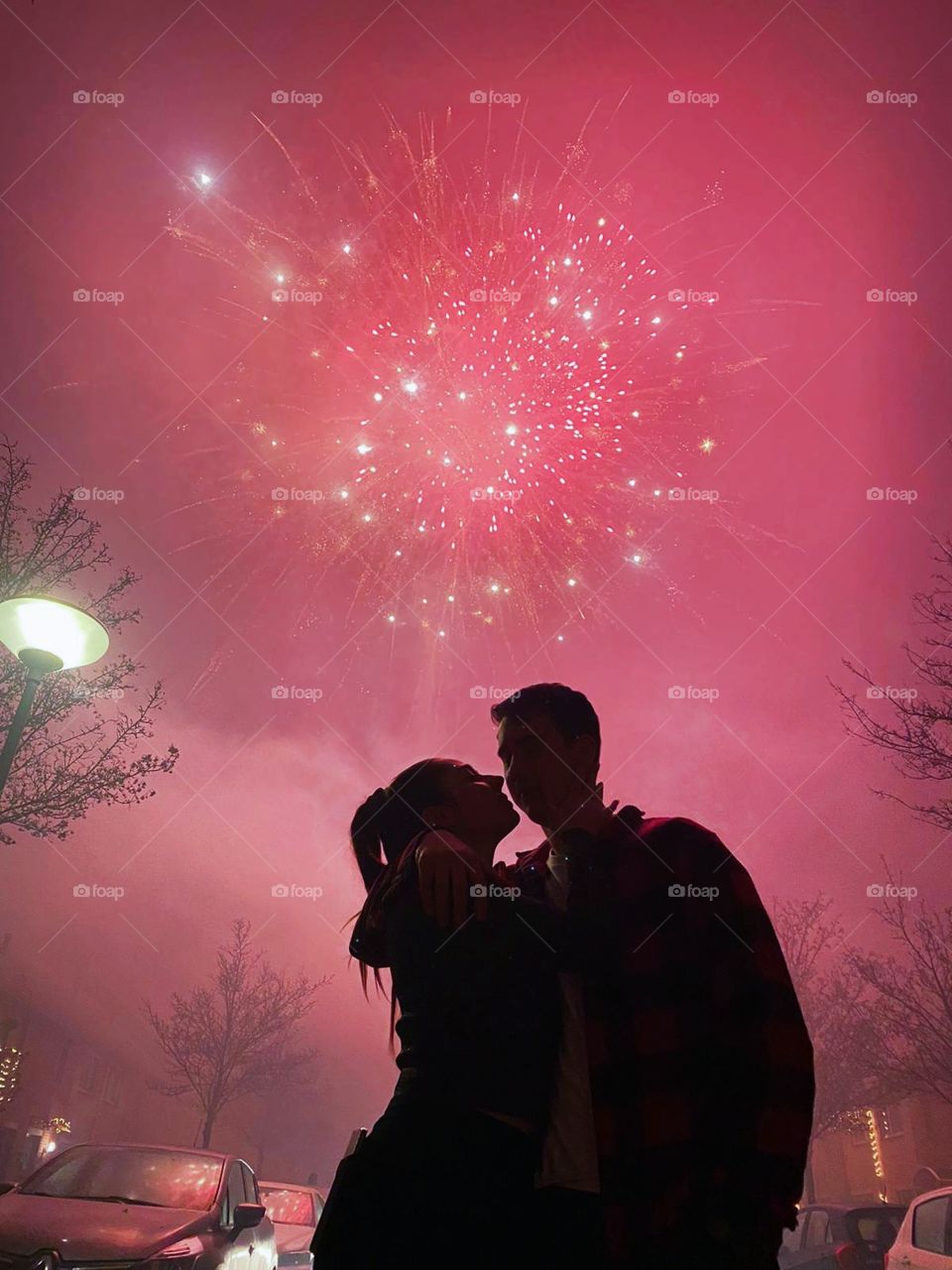 Couple under the nightsky,
newyears eve! Love, firework, party