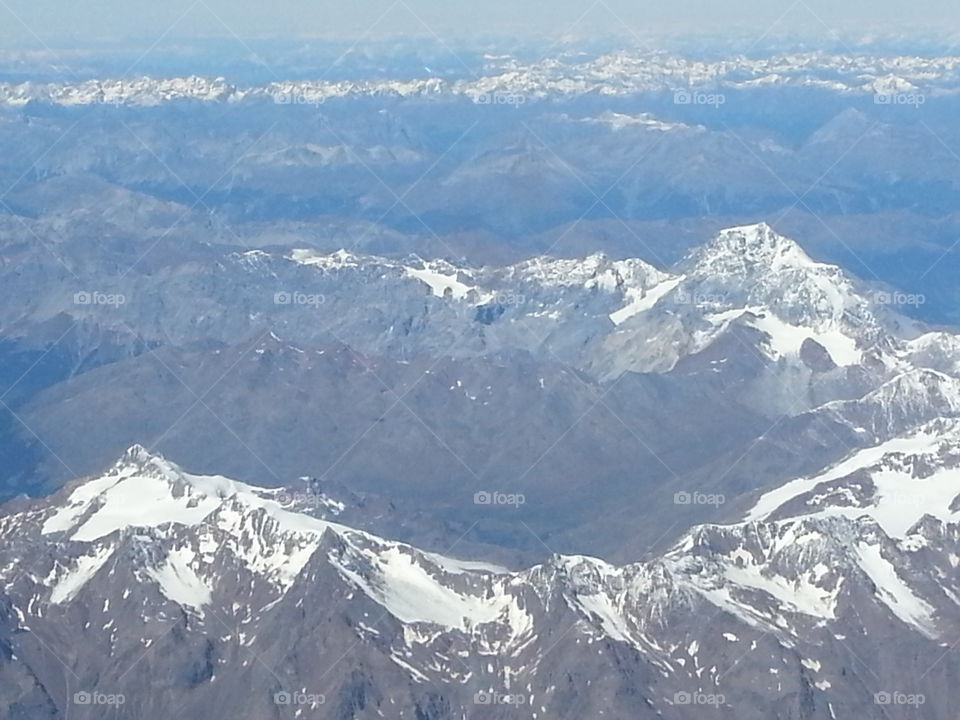 plane window view. view from plane ovet the Alps