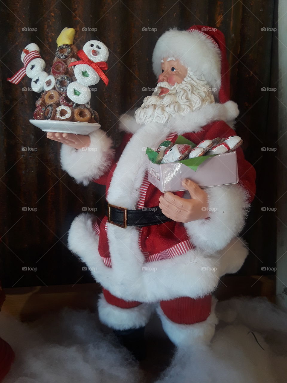 Santa Figure Holding Donut Tree