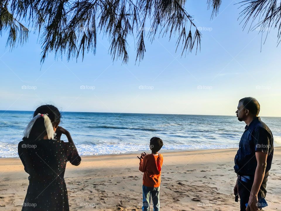 People Enjoying the view of Beach