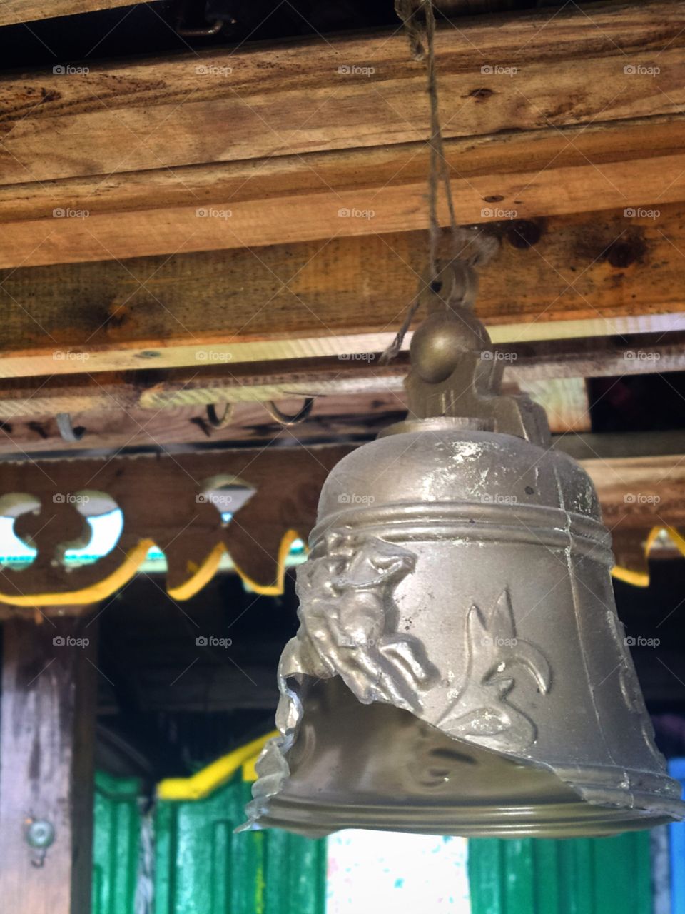 Broken bell that hangs on the gazebo