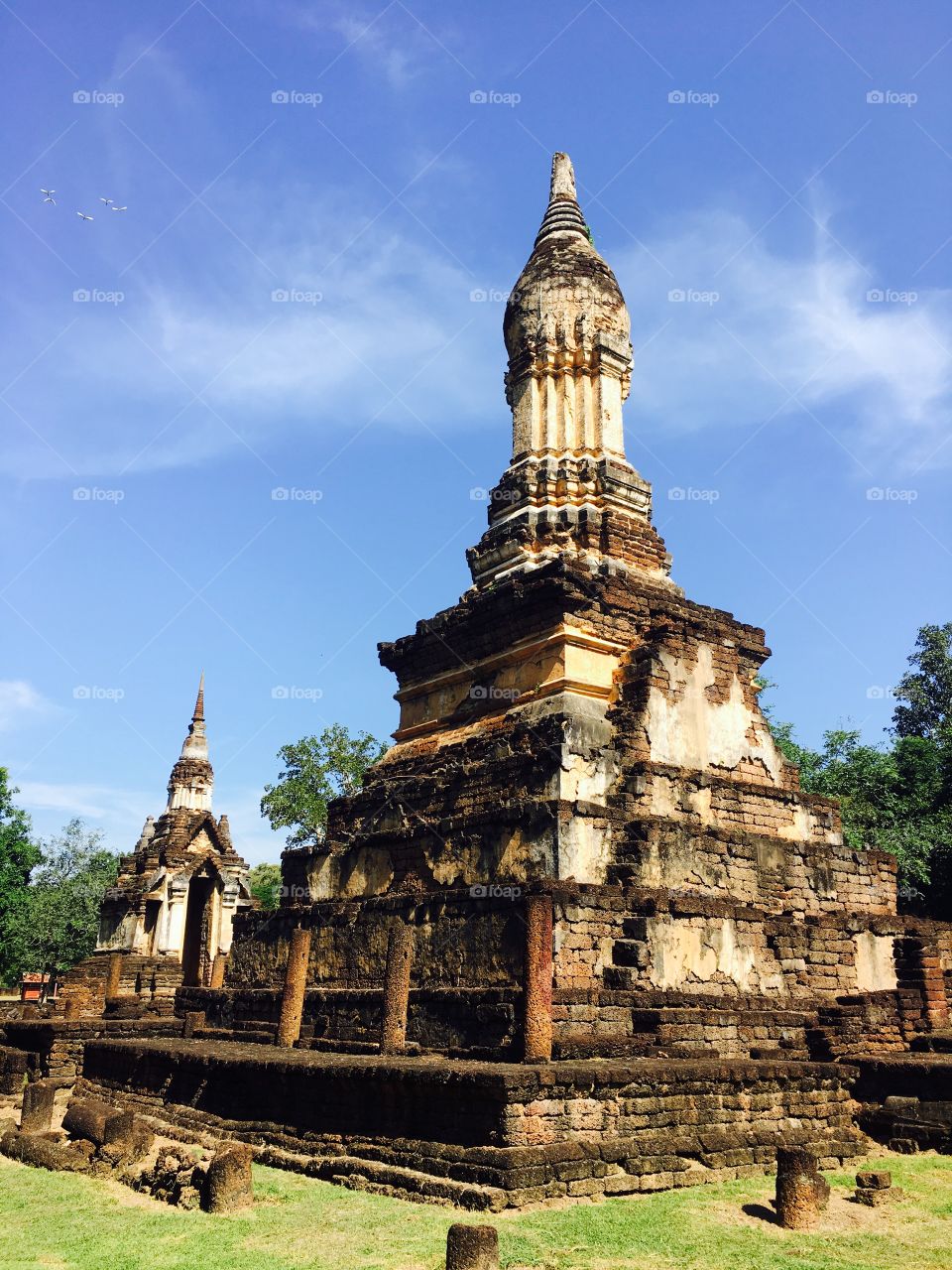 Wat chedi seven rows temple in Sukhothai, Thailand 