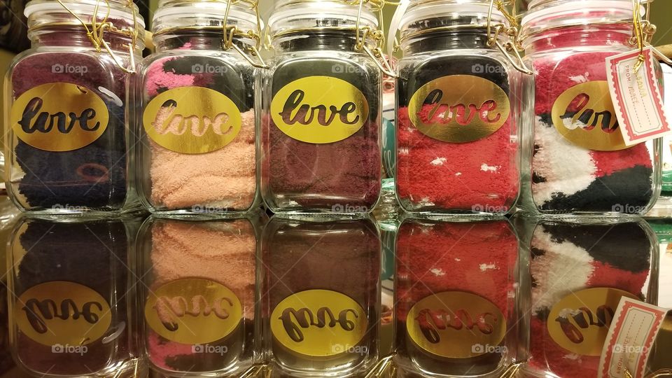 gift in a mason jar with gold stamped love lettering