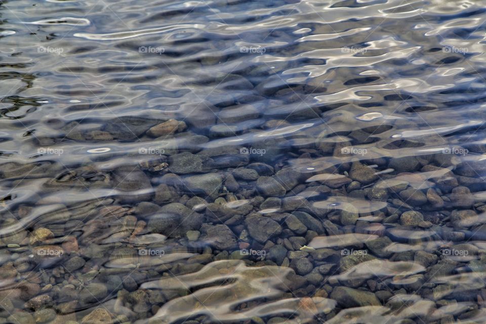 Shimmering clear water, lakes district, England