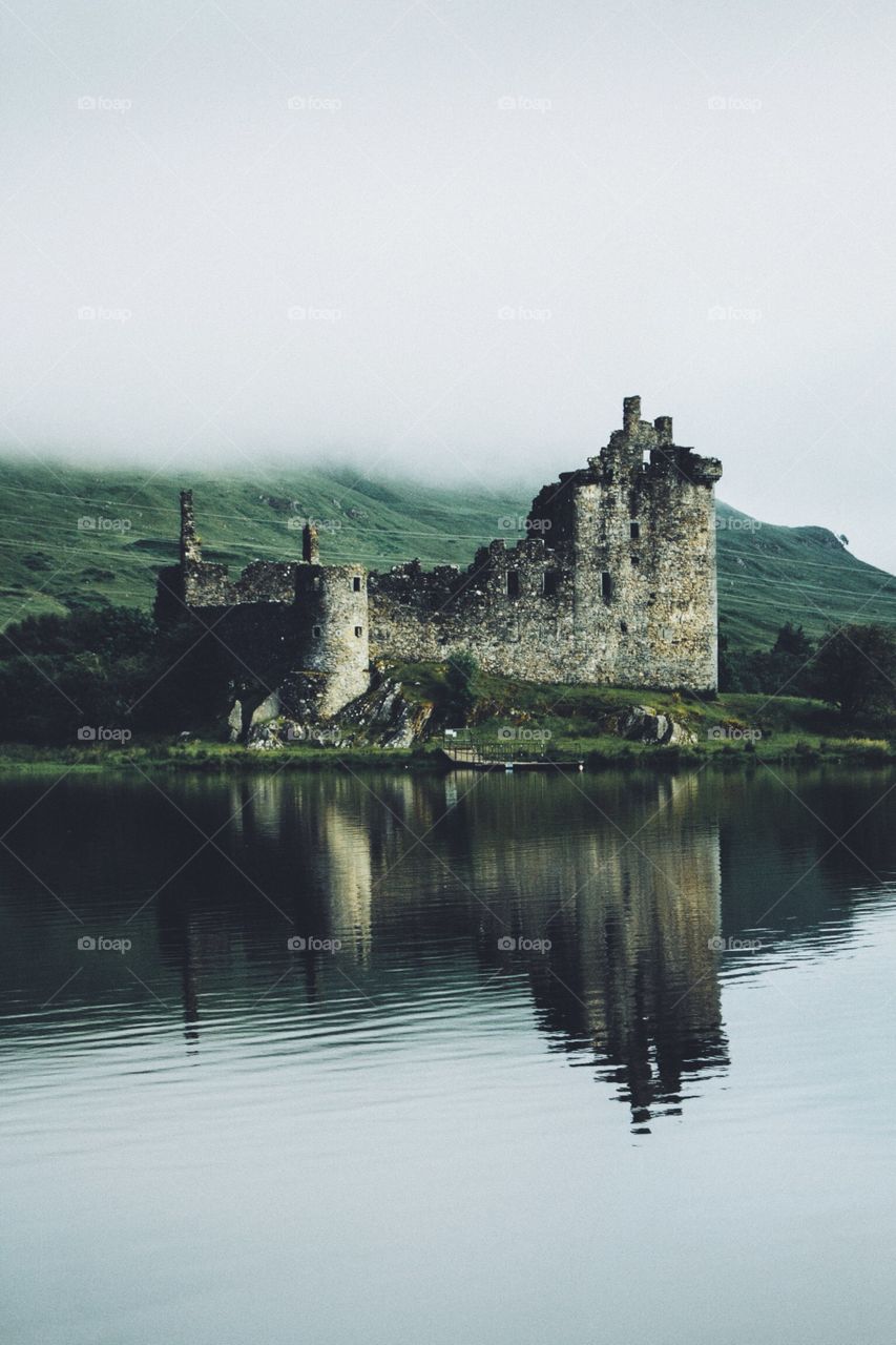Beautiful reflection of the kilchurn castle in Scotland 