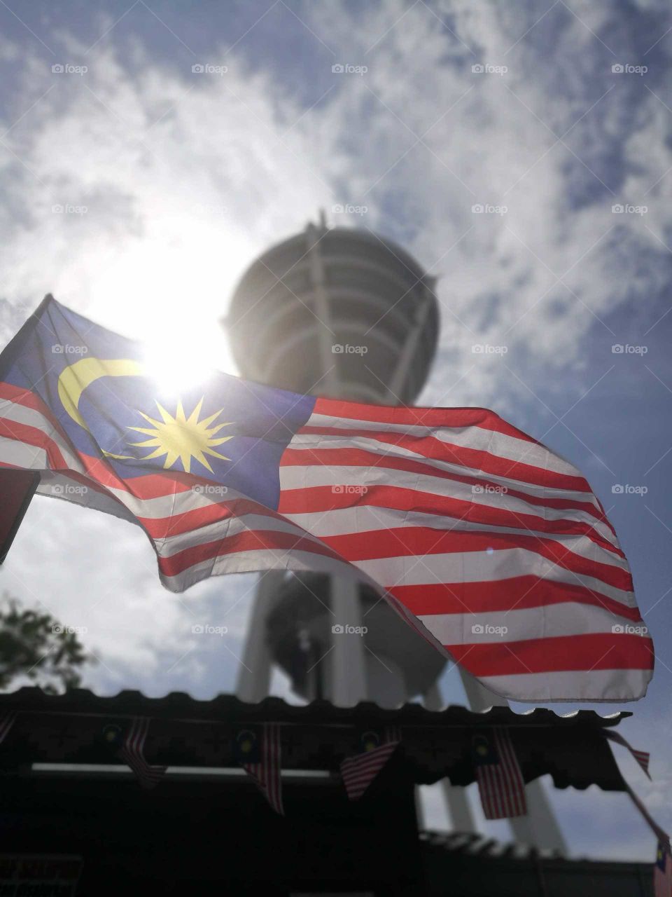 National flag with Alor Setar Tower as background