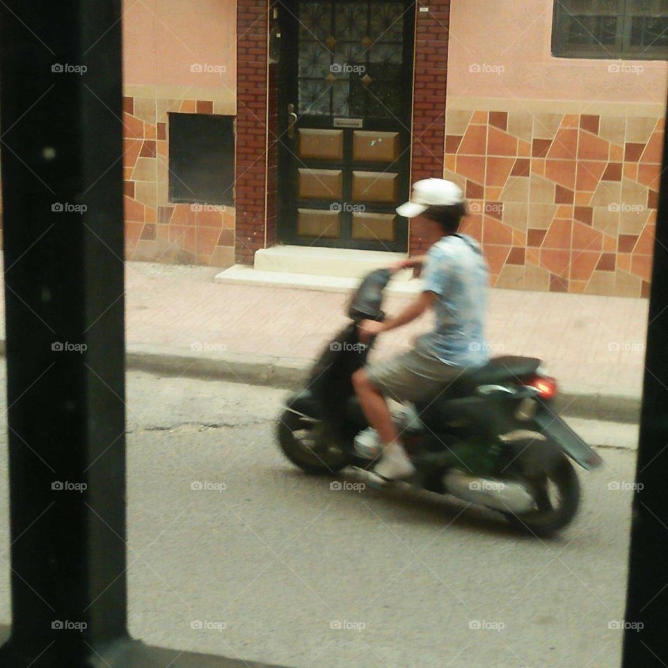 a young child on motocycle.