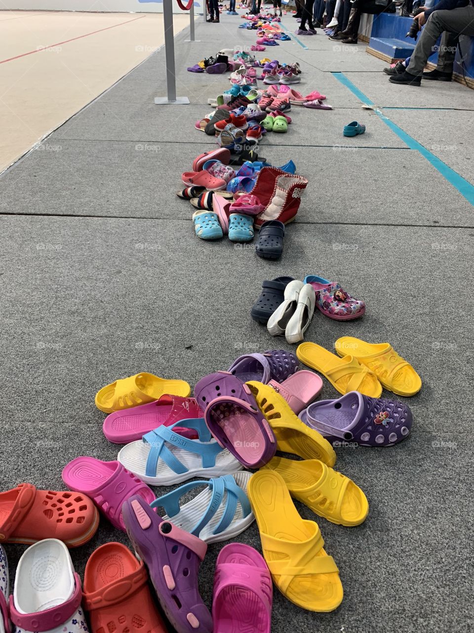 Little gymnasts took off their shoes before the start of the competition. A lot of shoes...