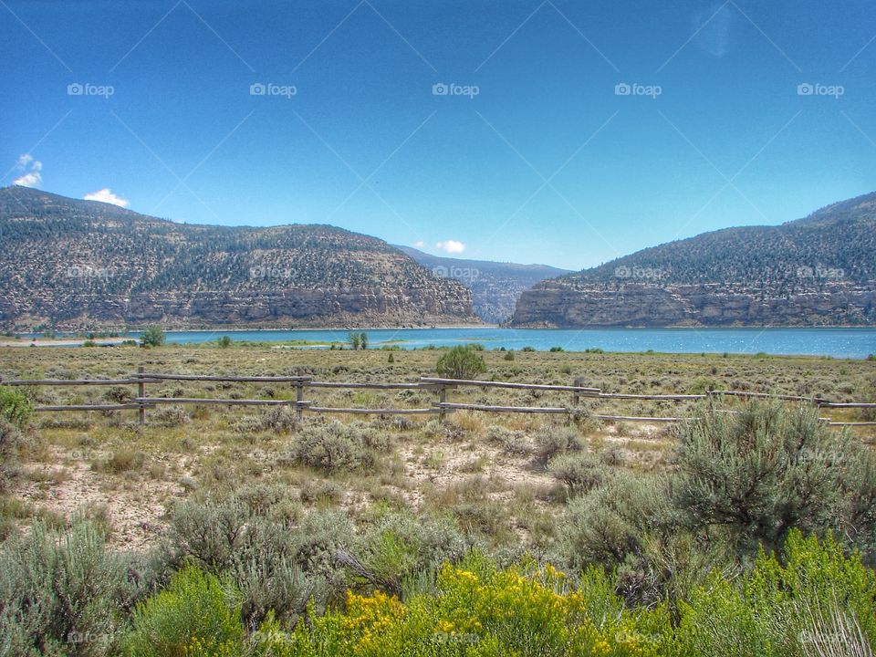 Mountain lake and fence