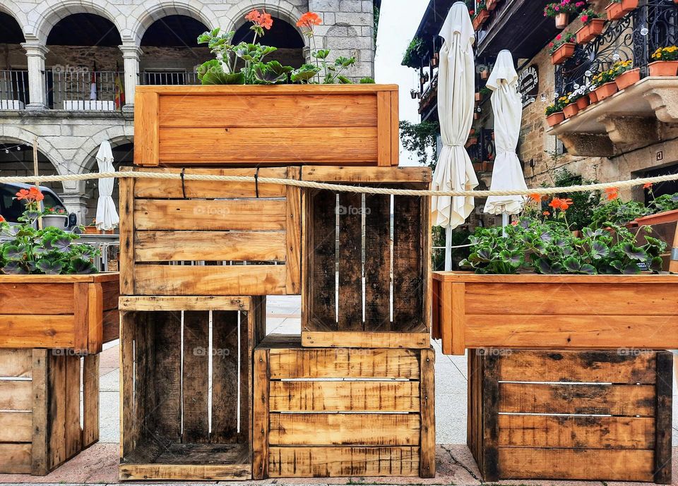 Wooden crates used as garden containers and as delineators