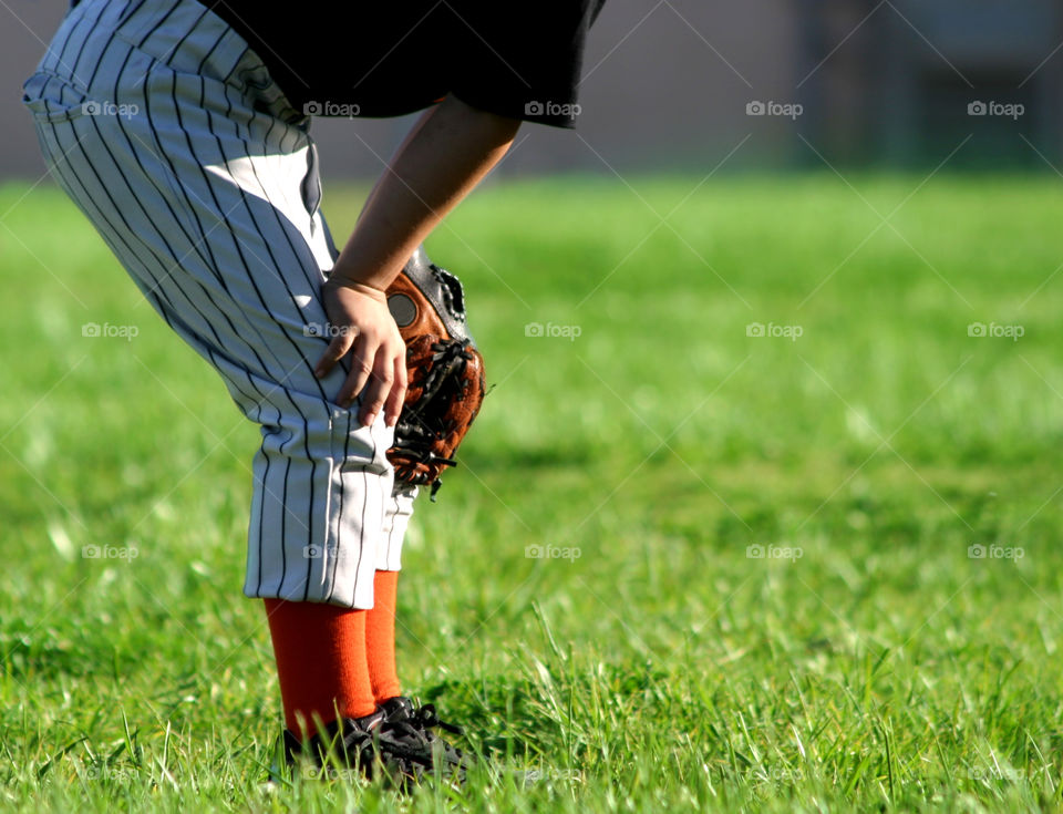 Close-up of a kid playing baseball