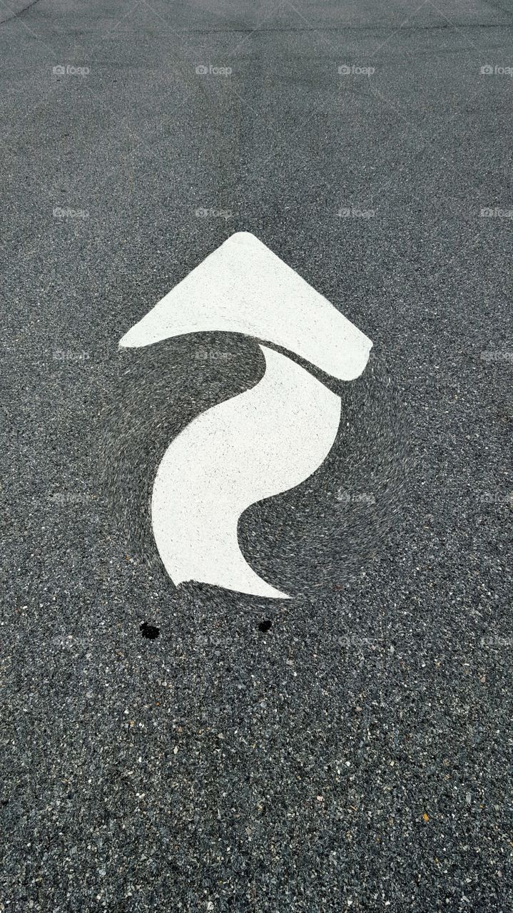 Funky road sign. Which way do I go?