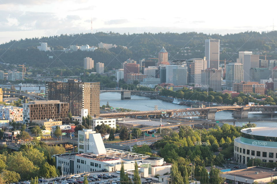 Portland, Oregon cityscape view from a rooftop on a nice day 