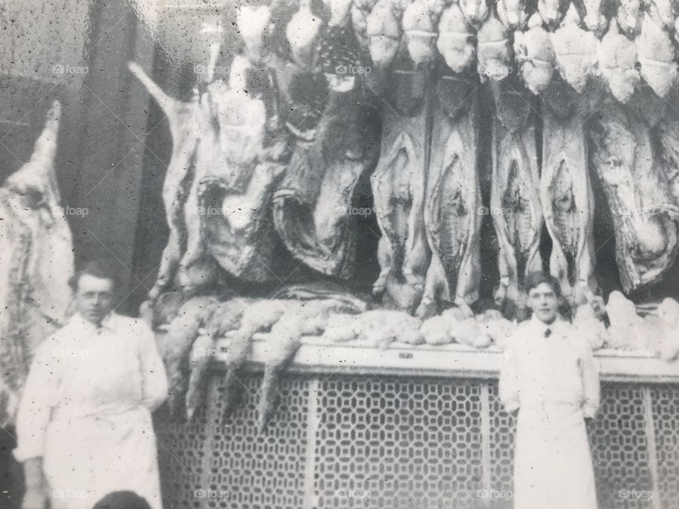 Early 20th century depiction of a butchers daily life