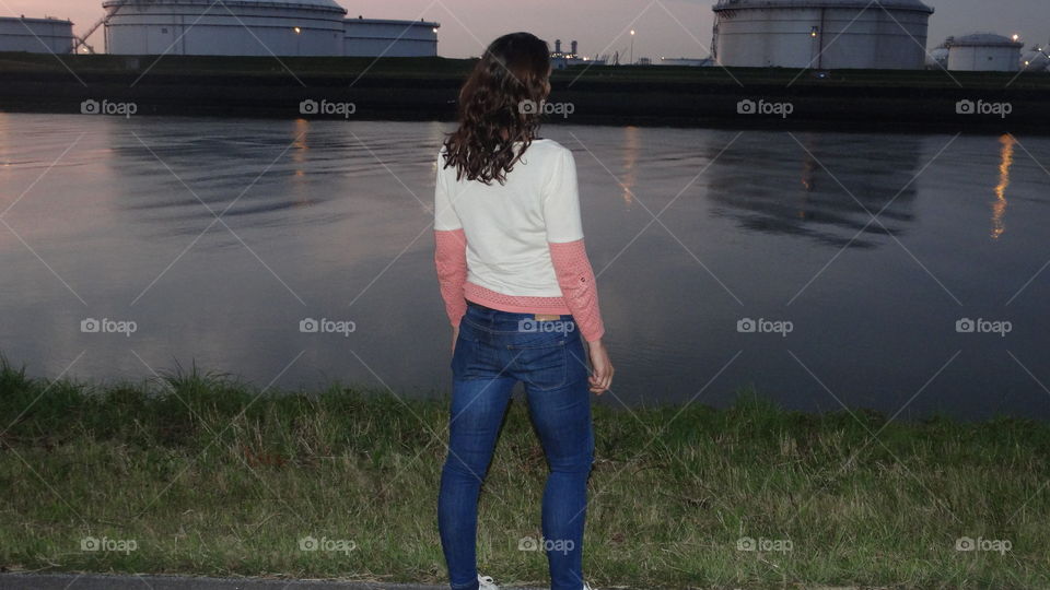 Along the water side 