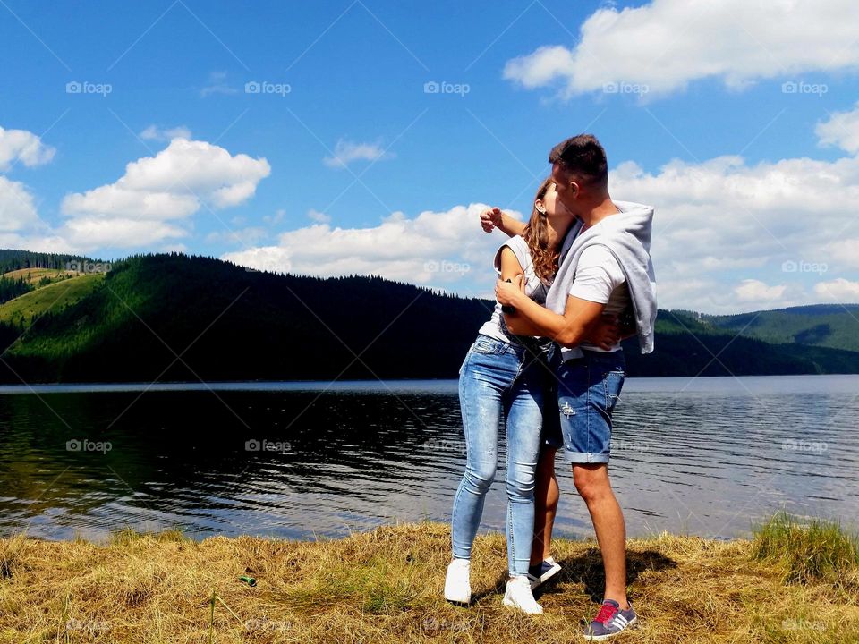 tender moment by the lake