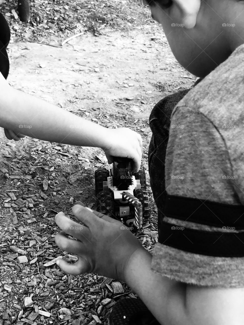 Sharing a toy with a new friend