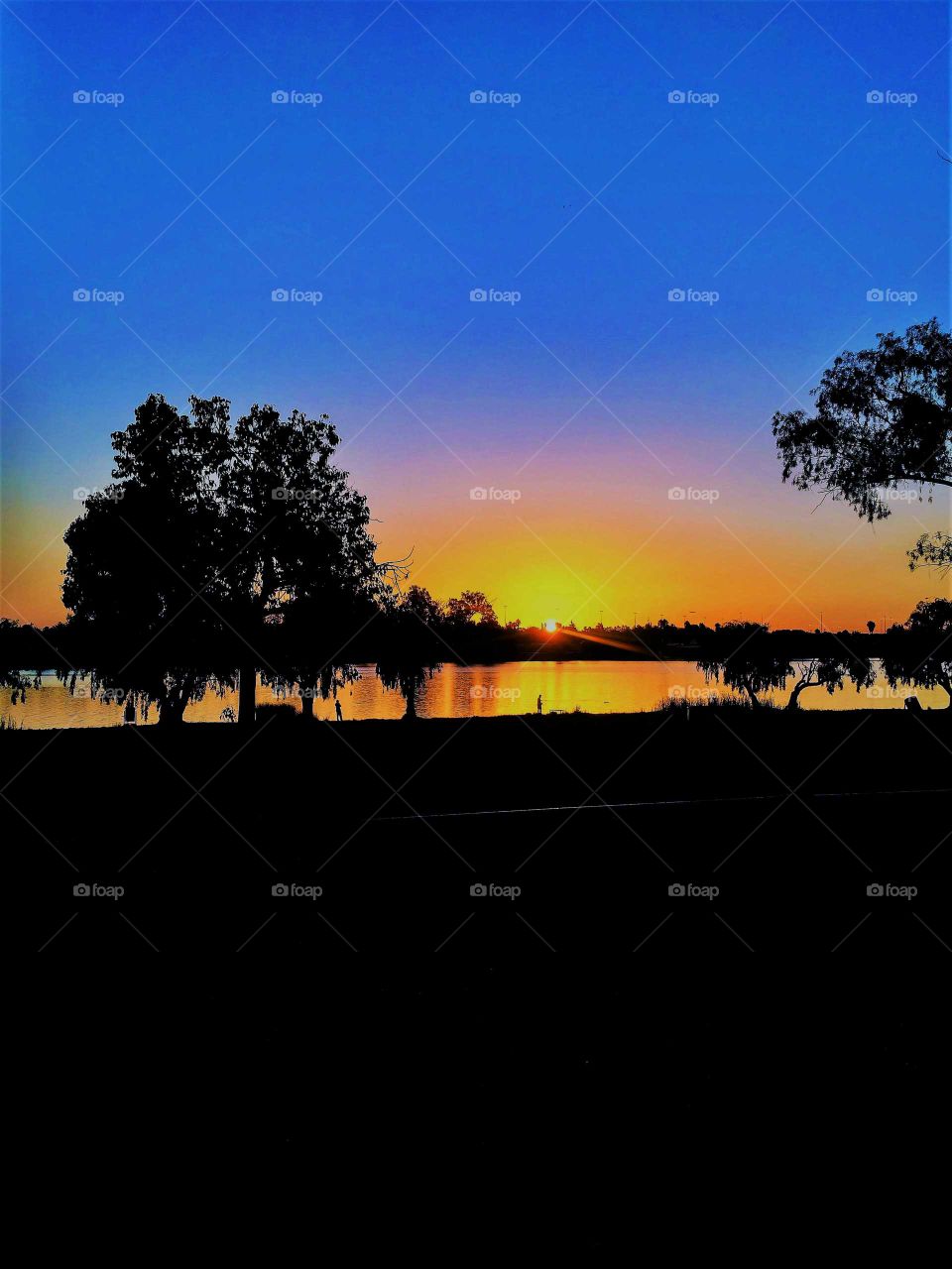 African sunset on lake