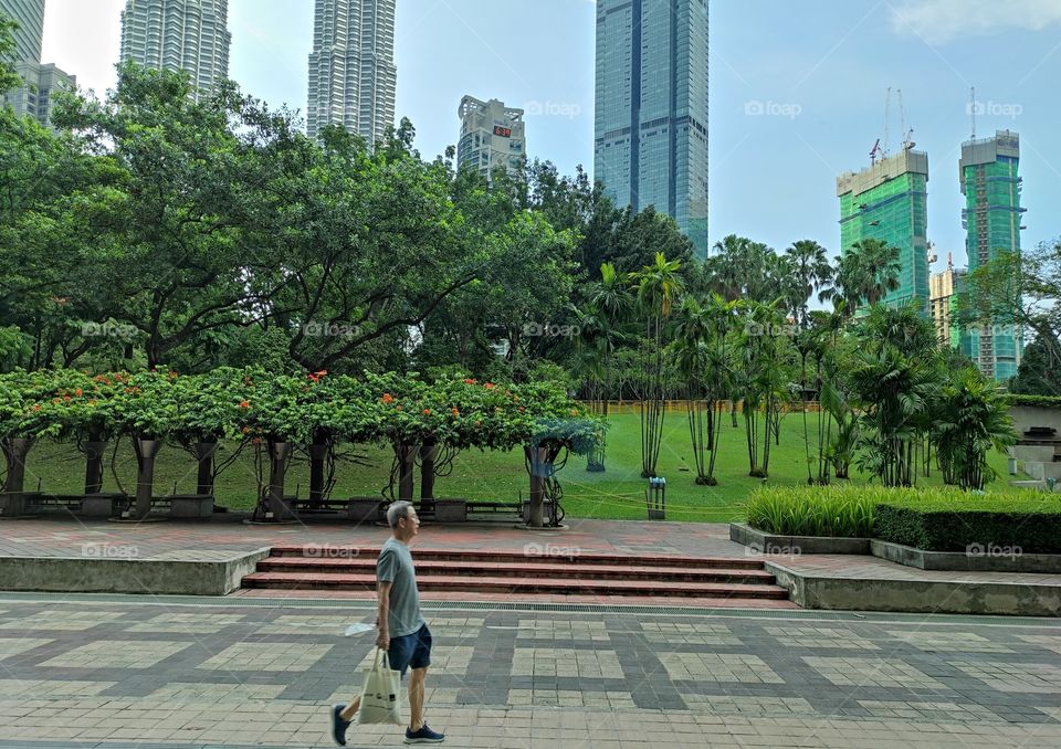 A man passing by the street