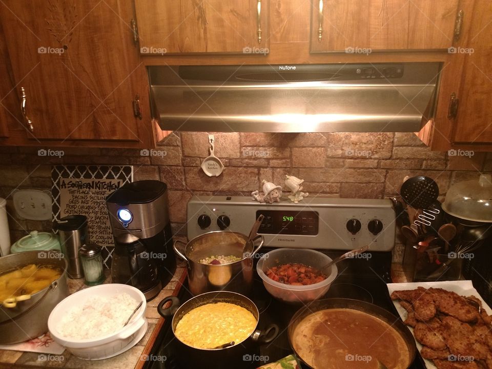 Sunday country cooking, rice and gravy, sweet potatoes, corn on cob, butter peas, macaroni and cheese