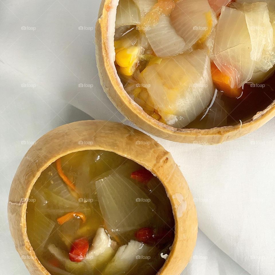 ABC soup and chicken Cordyceps with mushrooms soups in coconut husks