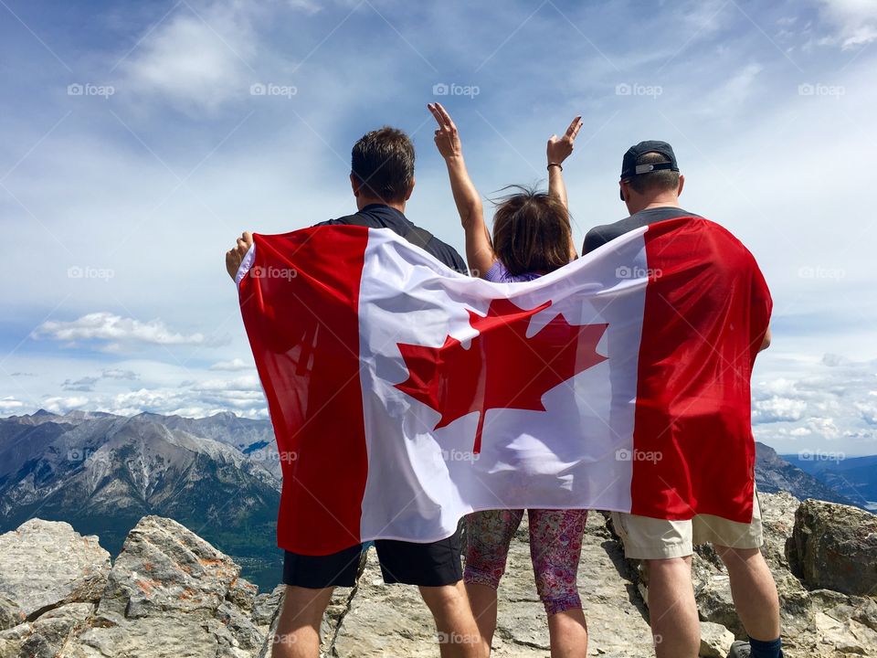 Friends celebrating Canada day on Summit of Ha ling Peak