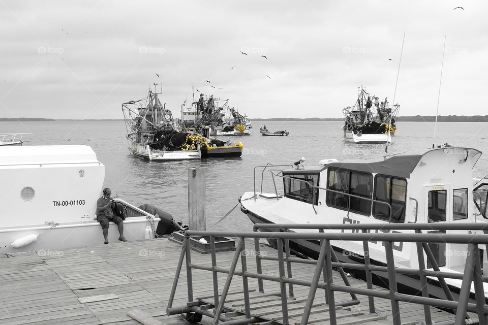 Artisanal fishermen's dock with fishing boats