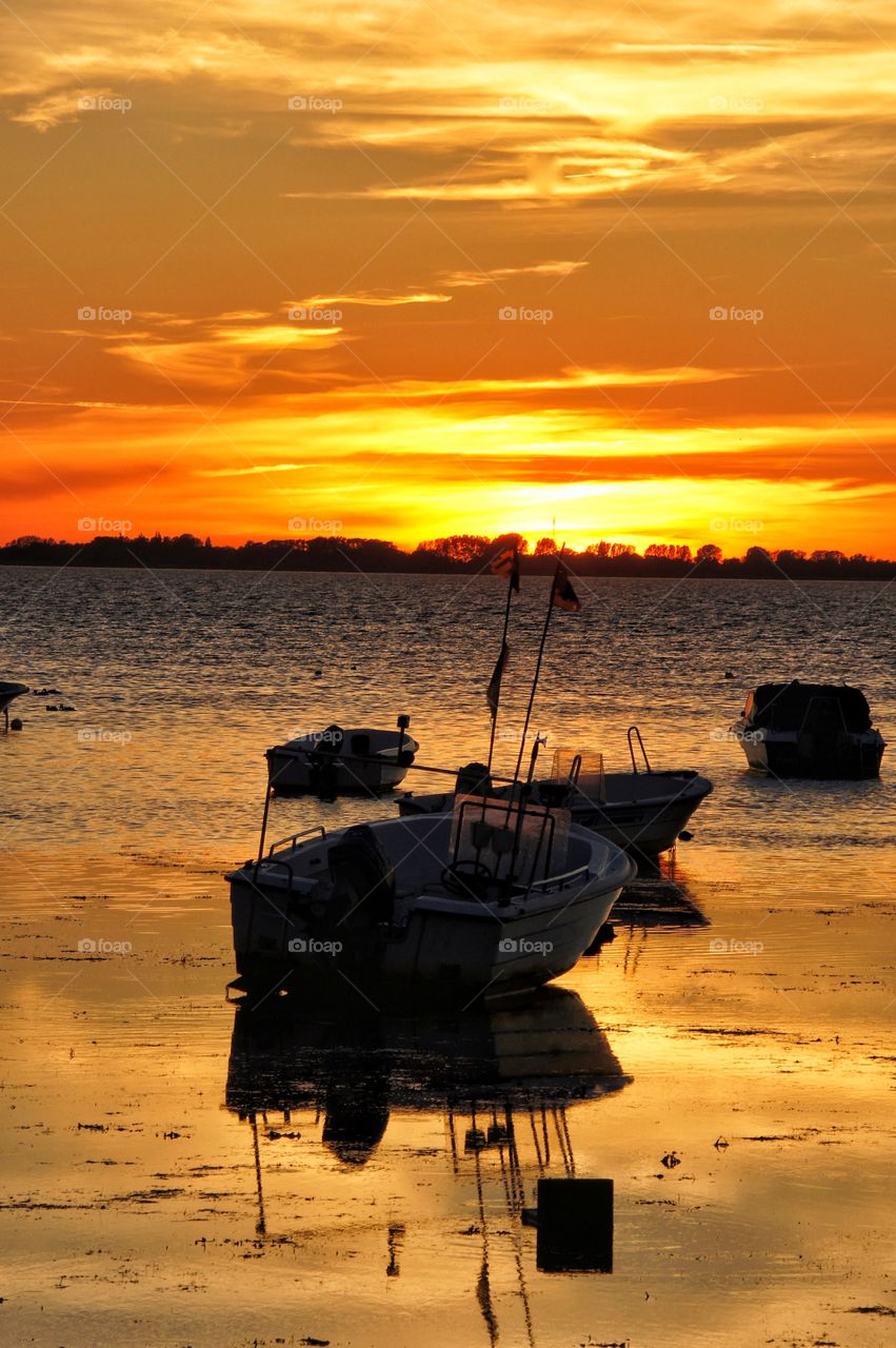 Boats in sunset