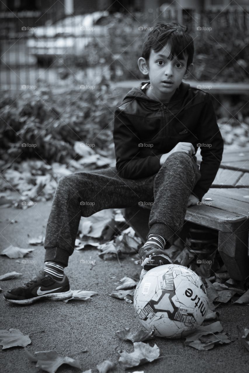 Boy in Park with Football 