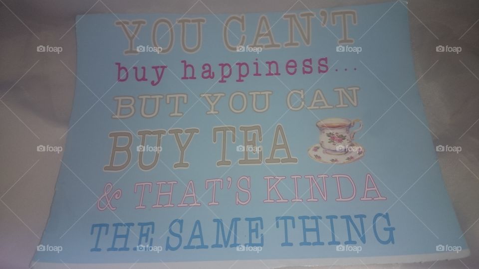 U can't buy happiness can buy tea and that's kinda the same thing quote on calendar in May