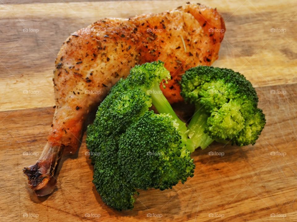 Chicken And Broccoli. Roasted Chicken With Fresh Broccoli
