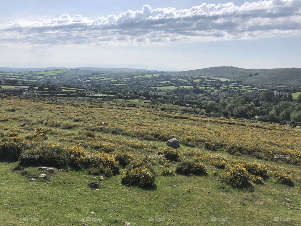 This Dartmoor National Park photograph has an added attraction, to this wild terrain, it’s sky amidst an array of white grey looks spectacular.