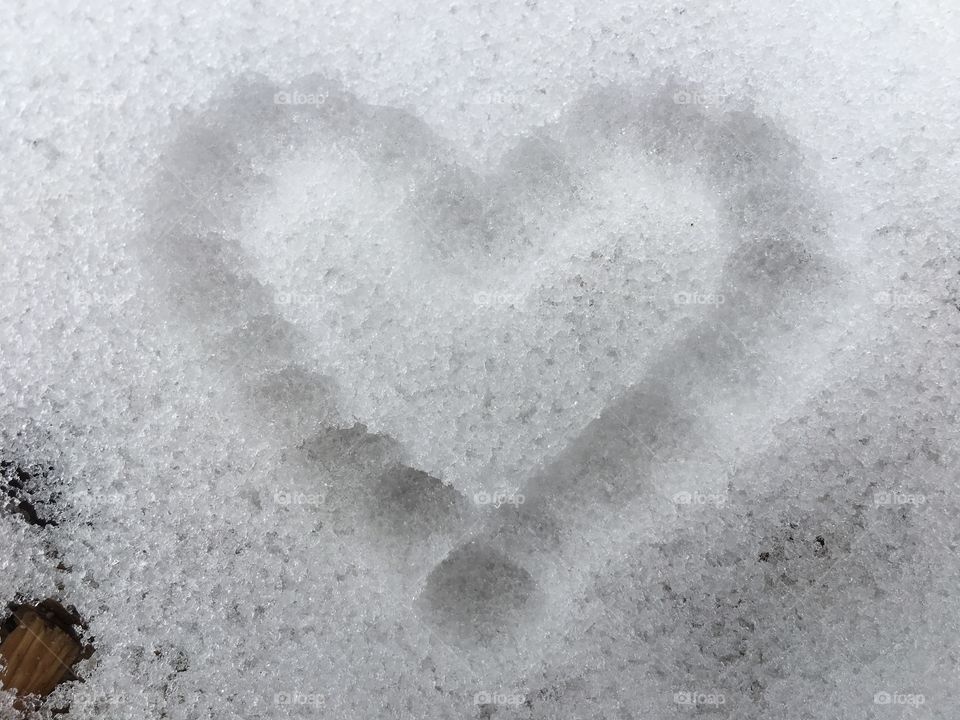 Heart shape traced in snow
