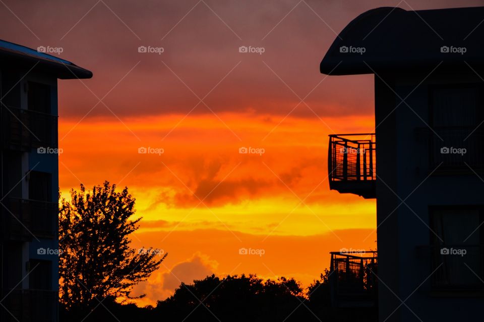 Silhouette of house during sunset