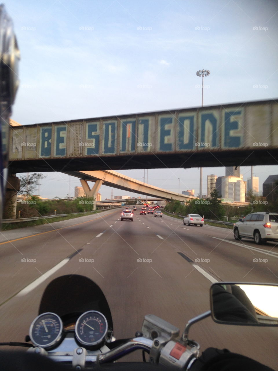 The original “Be Someone” in downtown Houston. Photo takin by myself off the back of a motorcycle in March 2014. 