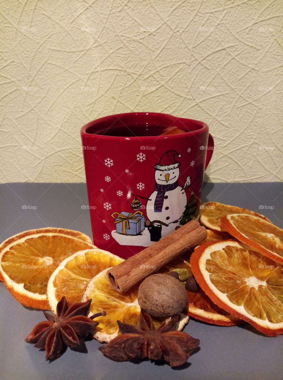 home made hot wine with orange, cinnamon and nutmeg