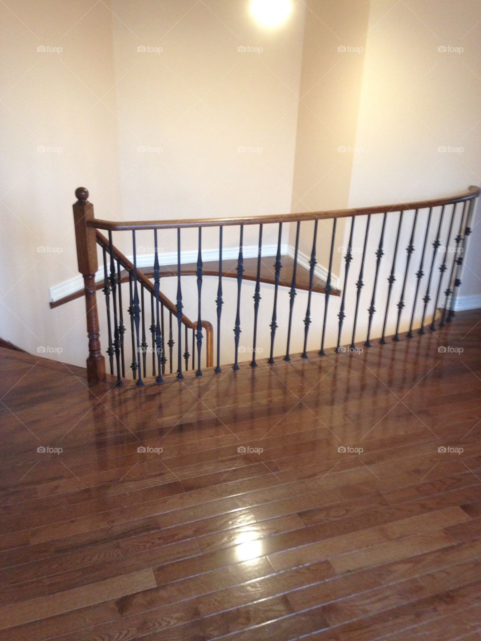New oak floors and railing stained to match. 